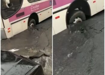 Asfalto afunda e ônibus fica preso após rompimento de tubulação na zona leste de Poços