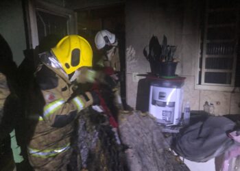 Bombeiros combatem princípio de incêndio em casa em Poços de Caldas