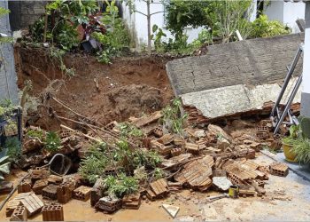 Chuva provoca queda de muro entre residências na zona Sul de Poços de Caldas
