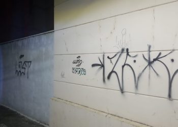 PM prende homem que pichava muro de colégio em Poços de Caldas