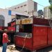 Trailers de lanche são retirados na Praça Dom Pedro II em Poços de Caldas