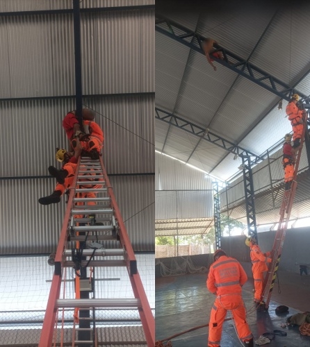 Homem sobe em quadra esportiva para buscar bola, fica preso a 15 metros de altura e é salvo pelos bombeiros